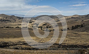 Along the road from San Pedro de Tiquina to Copacabana on the Titicaca lake, the largest highaltitude lake in the world 3808m photo